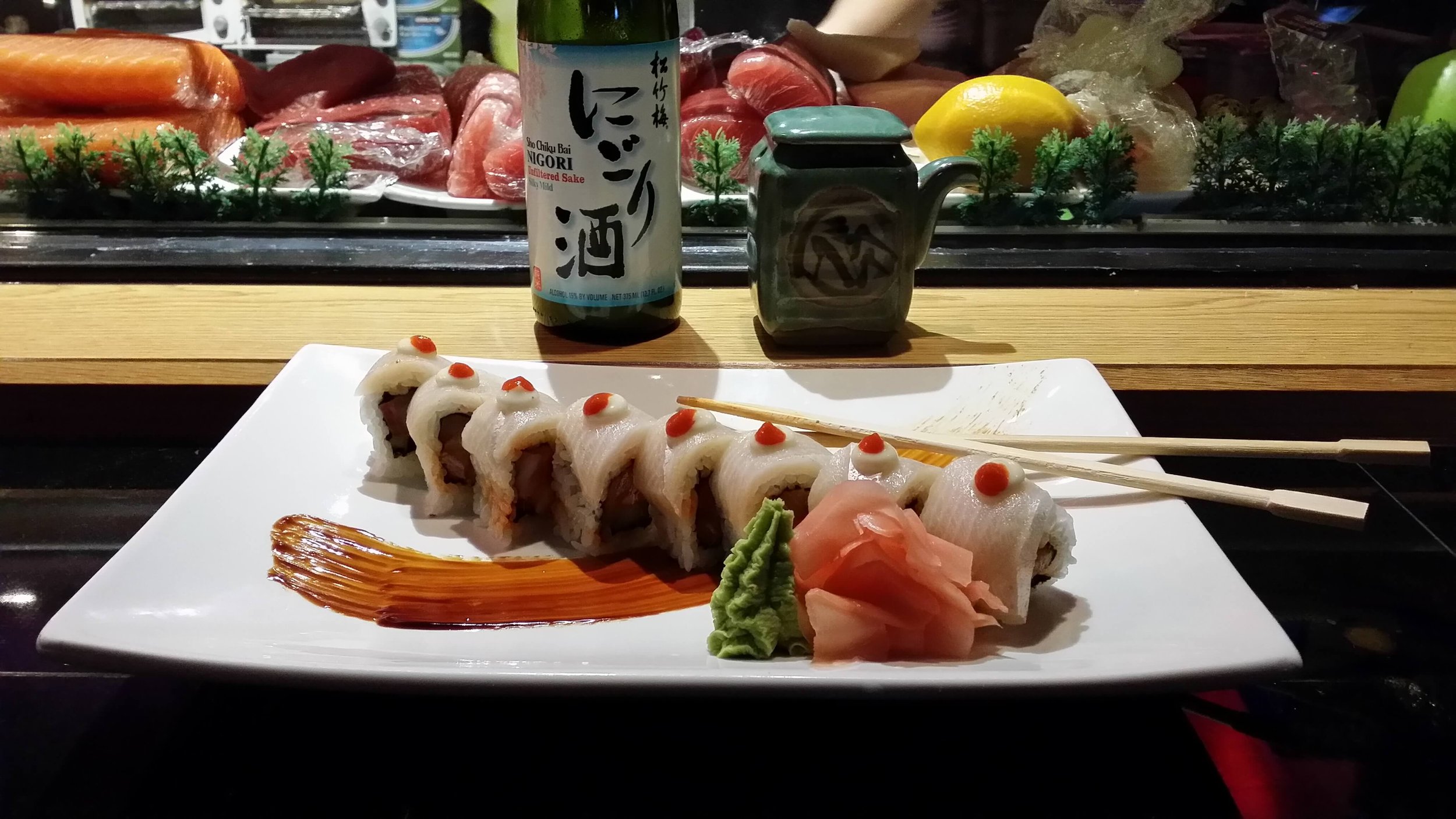 Ronnie-Sushi-Roll-and-Sake.jpeg